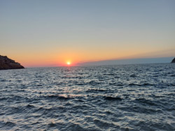 Il tramonto dal castello di Mirina con sullo sfondo Monte Athos